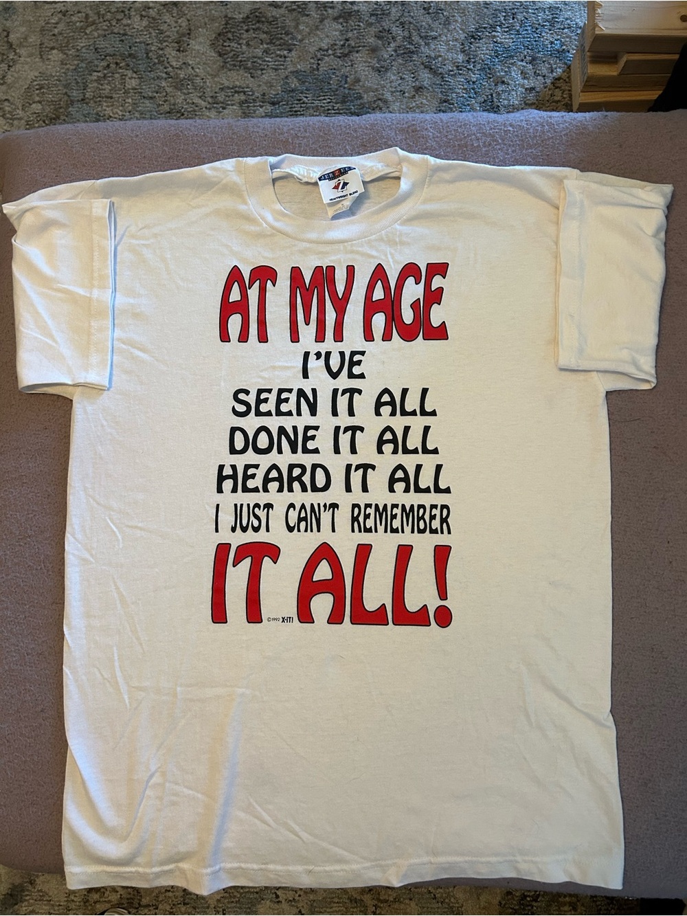 White Short-Sleeve Graphic Tee with Bold Red Motto